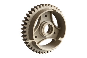 a sample part manufactured in PEEK Material, the part is a gear cog